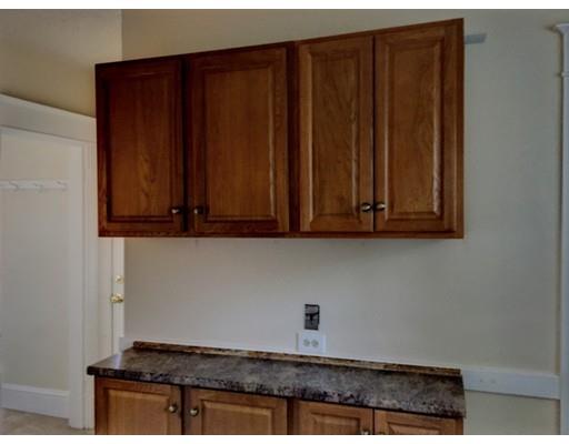 90 Lucerne Road Springfield, MA 01119 - Photo 8 of 24 a view of wooden cabinets
