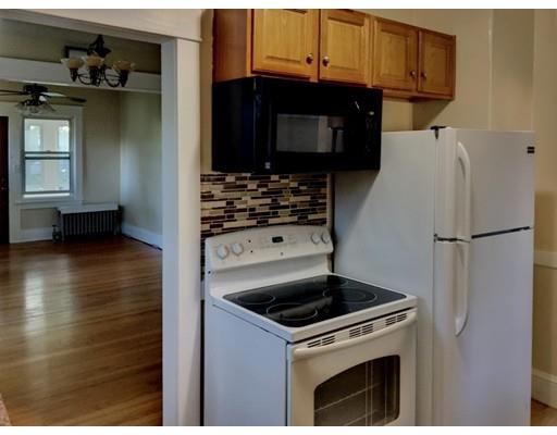 90 Lucerne Road Springfield, MA 01119 - Photo 9 of 24 a kitchen with a stove and a microwave