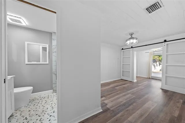 a large kitchen with cabinets