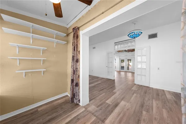 a view of a house with backyard and porch