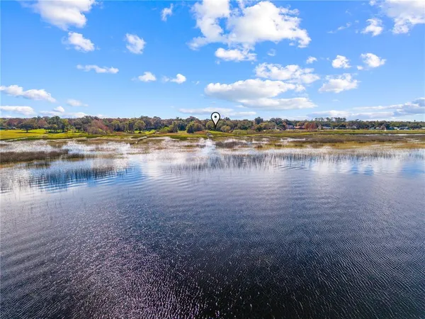 a view of a lake with a city