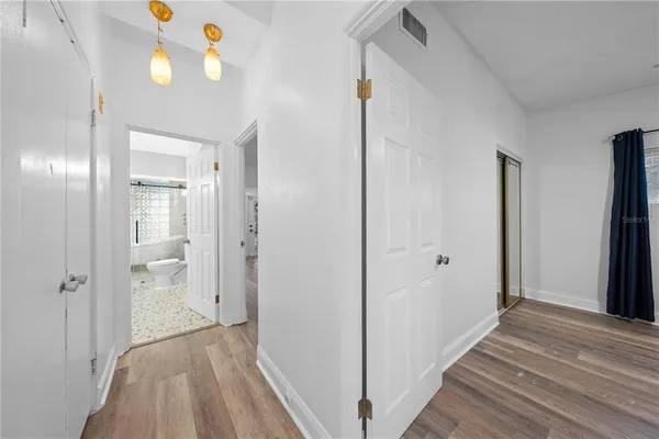 a view of a trees with a yard