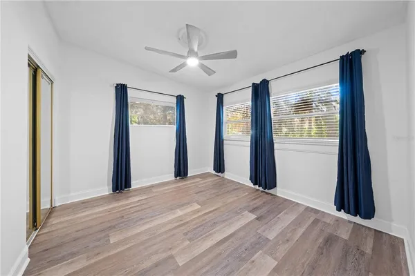 a view of a backyard with a sitting area