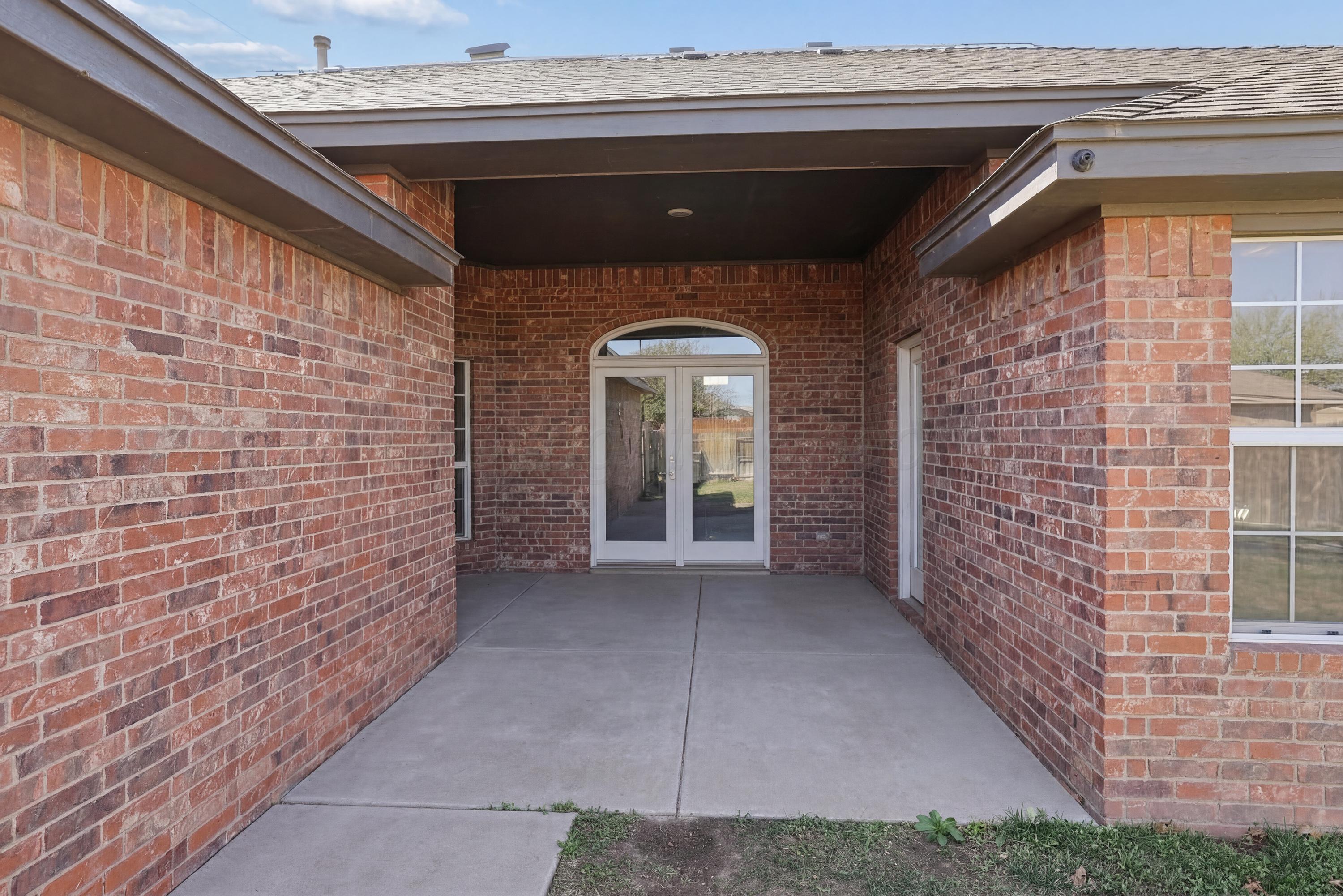 6400 Rally Road Amarillo, TX 79119 - Photo 19 of 21 a view of entryway with brick walls