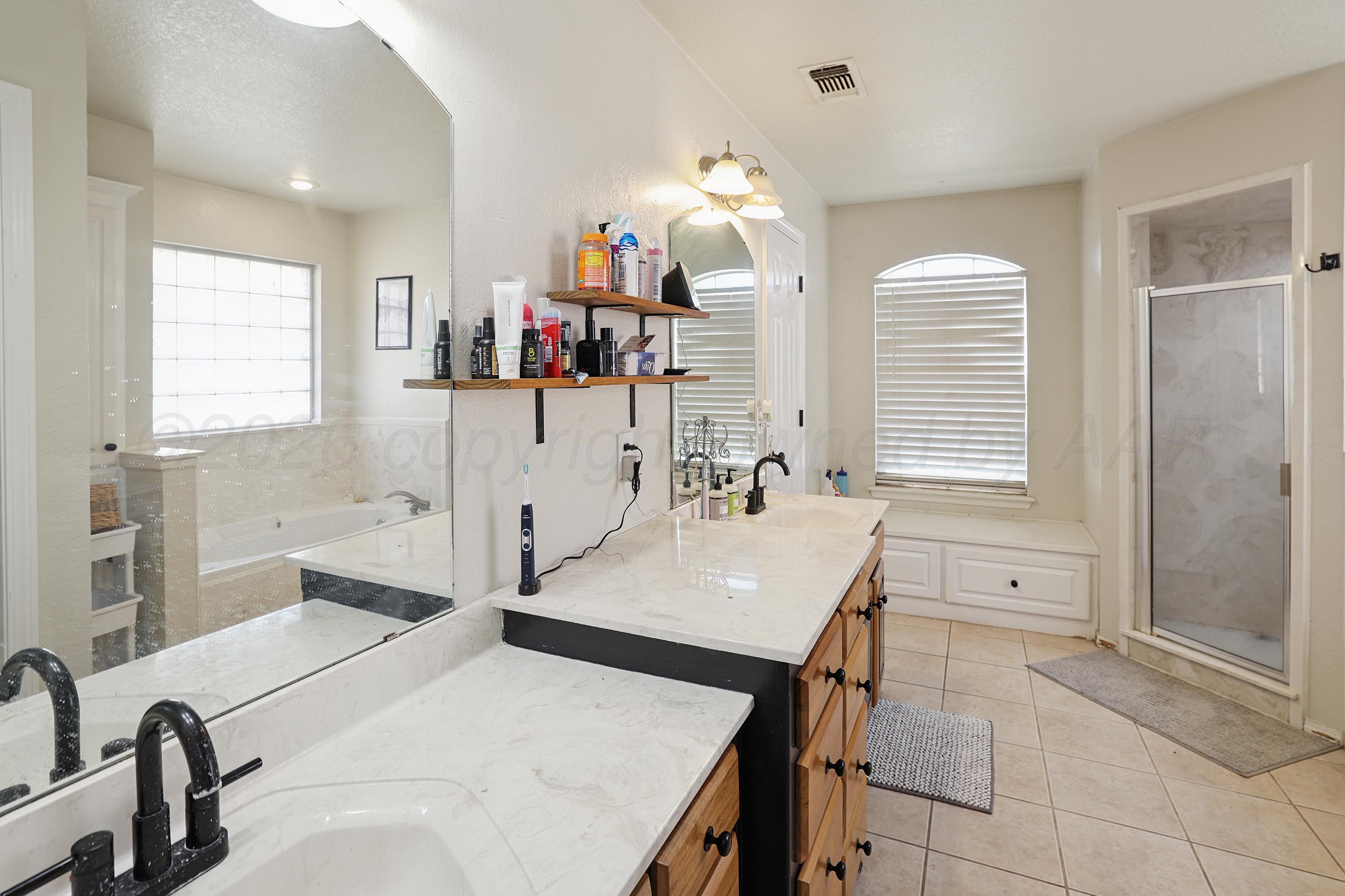 6400 Rally Road Amarillo, TX 79119 - Photo 10 of 21 a very nice looking dining room with a table and chairs