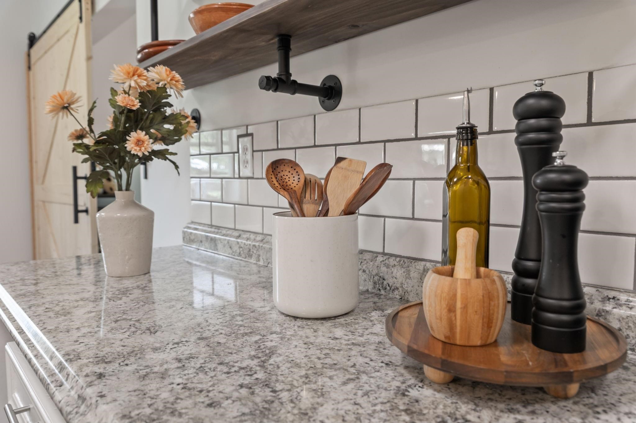 1010 Long Street Conroe, TX 77301 - Photo 14 of 26 a vase of flowers with a vase of flowers