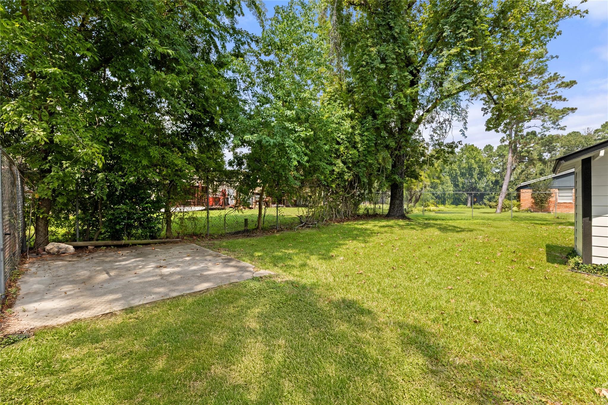 1010 Long Street Conroe, TX 77301 - Photo 26 of 26 a view of yard with green space
