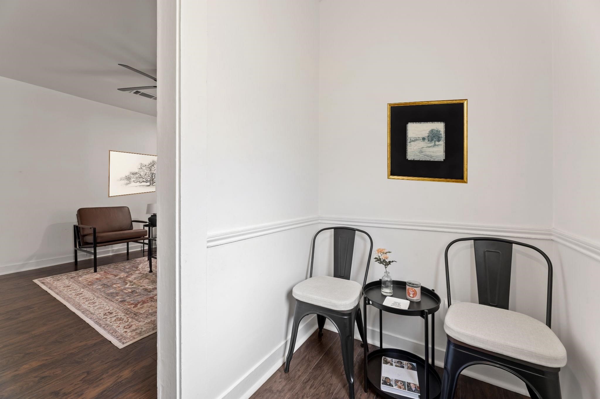 1010 Long Street Conroe, TX 77301 - Photo 6 of 26 a view of a workspace area with furniture and wooden floor