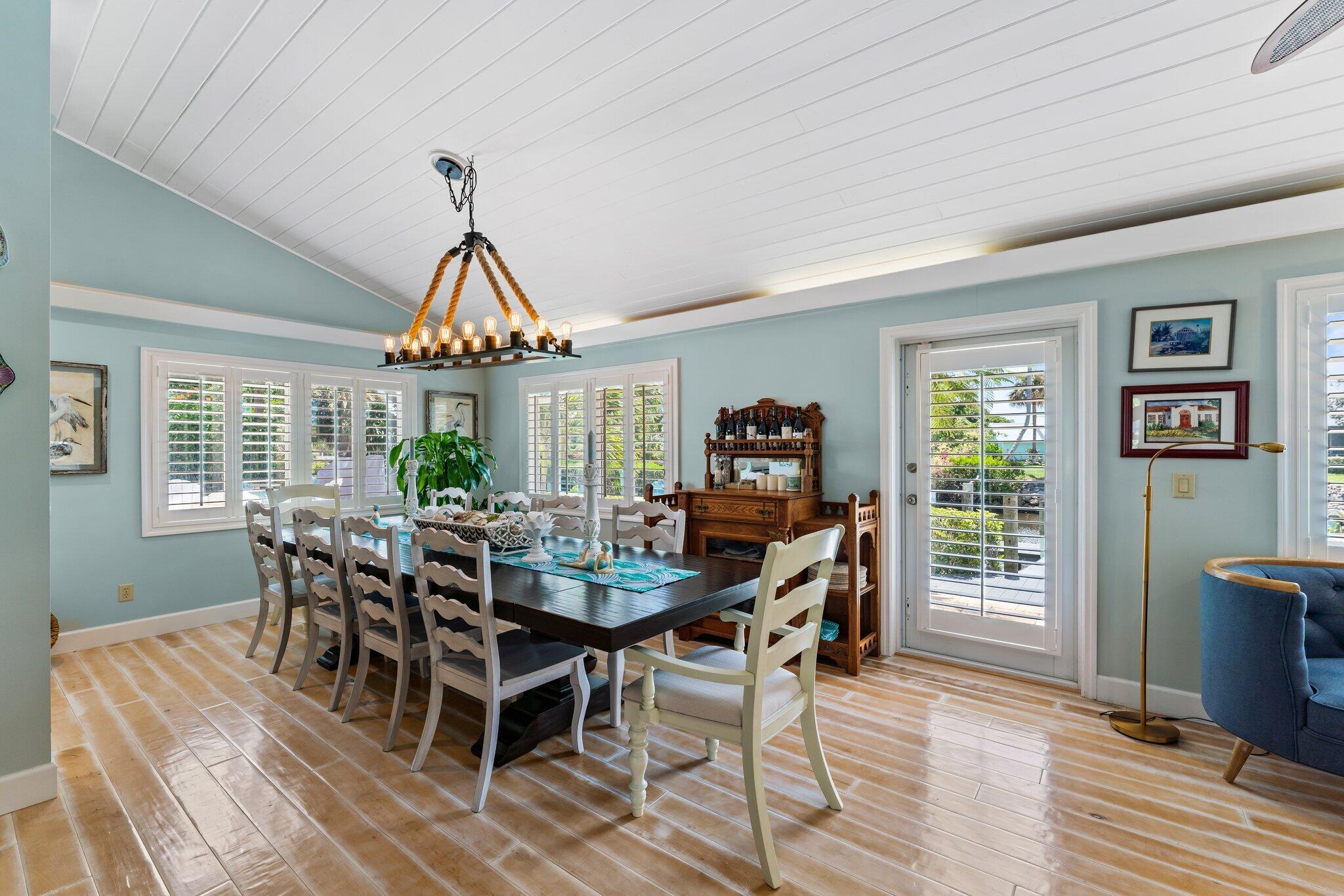4120 Southeast Whiticar Way Stuart, FL 34997 - Photo 16 of 60 a view of a dining room with furniture window and wooden floor
