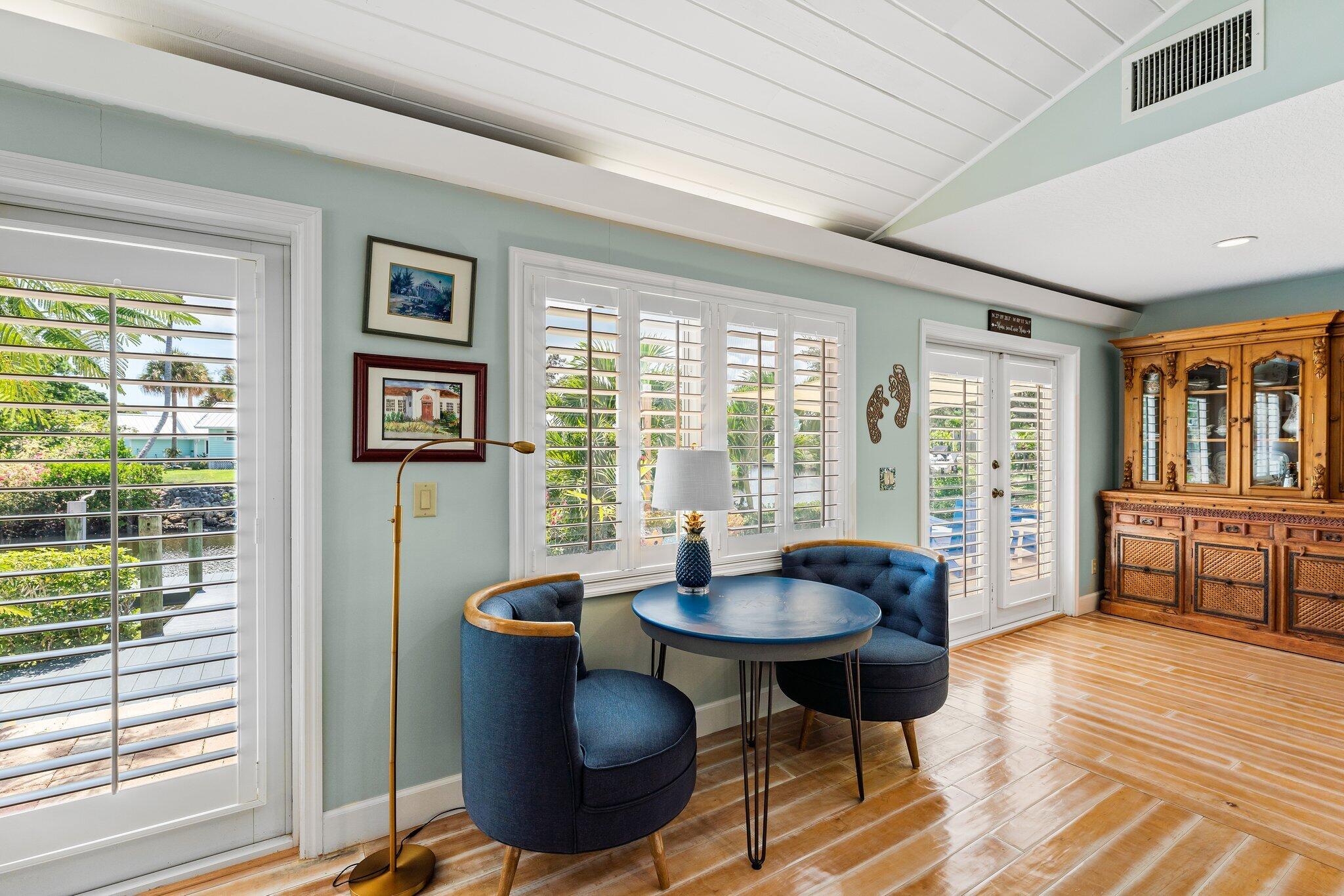 4120 Southeast Whiticar Way Stuart, FL 34997 - Photo 19 of 60 a view of a dining room with furniture window and wooden floor