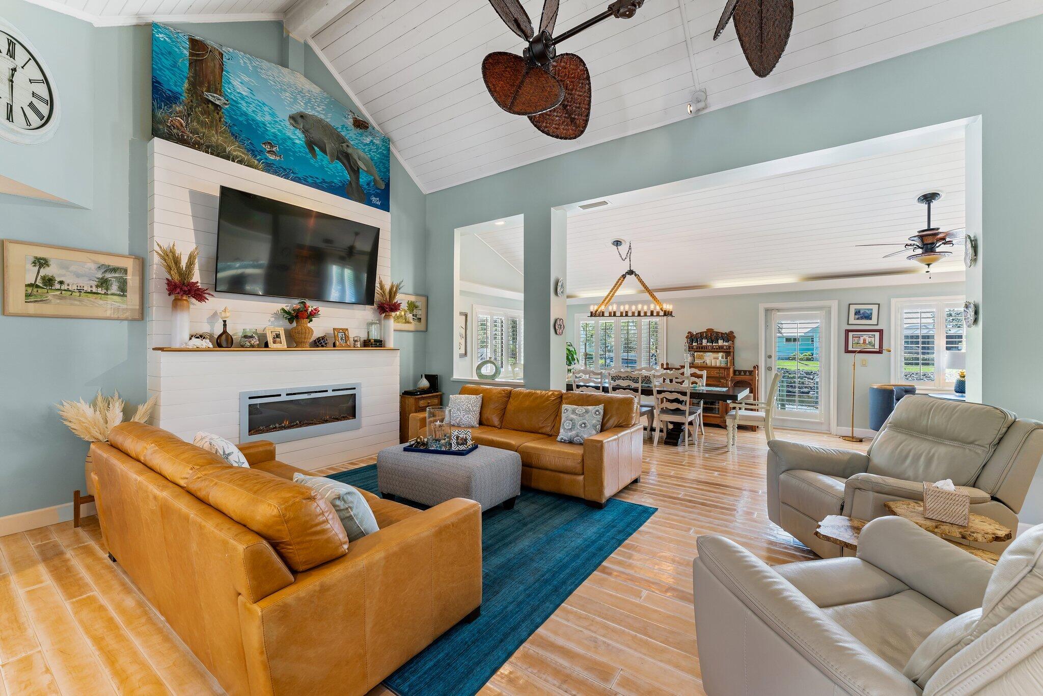 4120 Southeast Whiticar Way Stuart, FL 34997 - Photo 10 of 60 a living room with furniture kitchen view and a large window