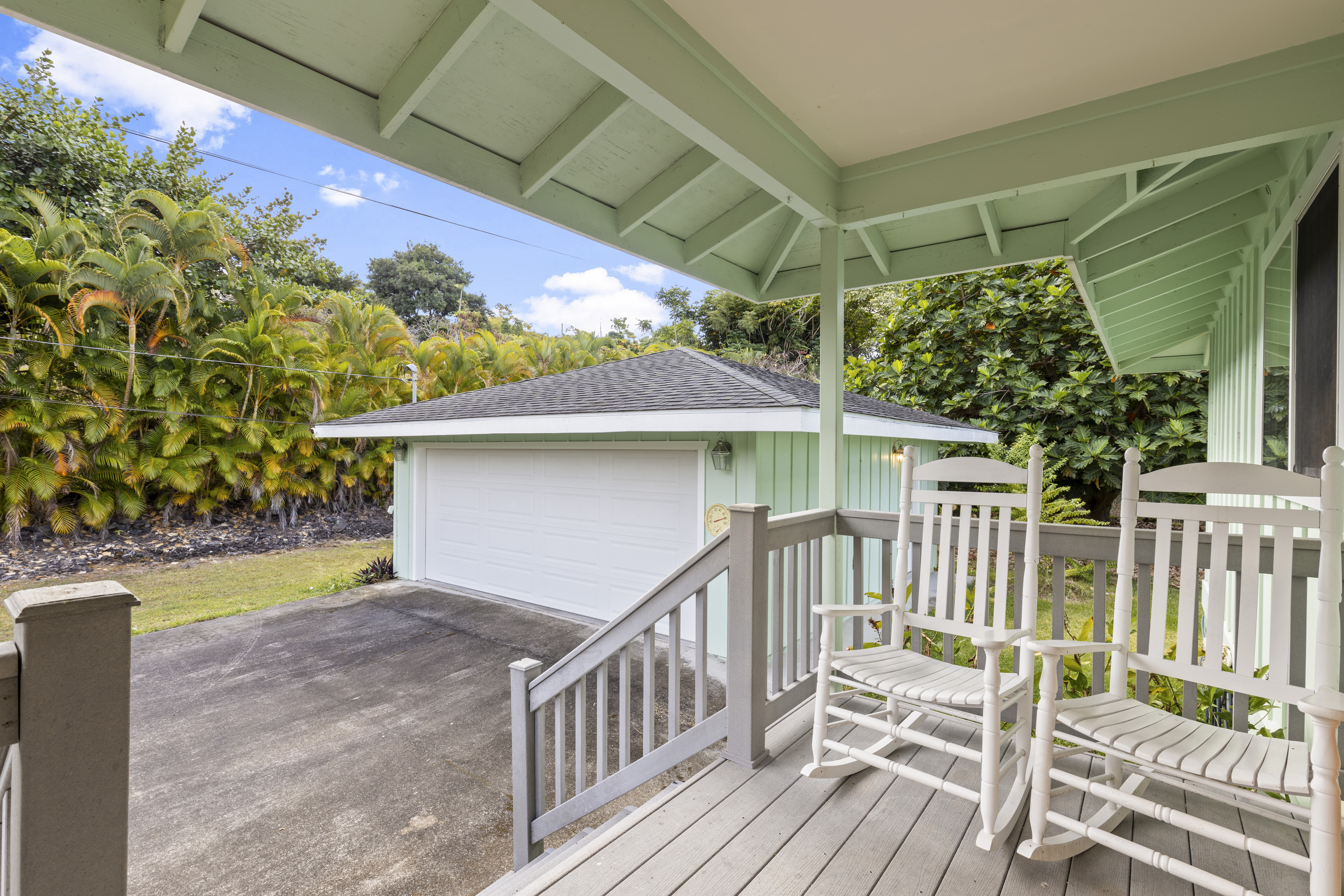 84-4955 Ke Ala O Keawe Road Captain Cook, HI 96704 - Photo 3 of 23 a view of a chair and table in the patio