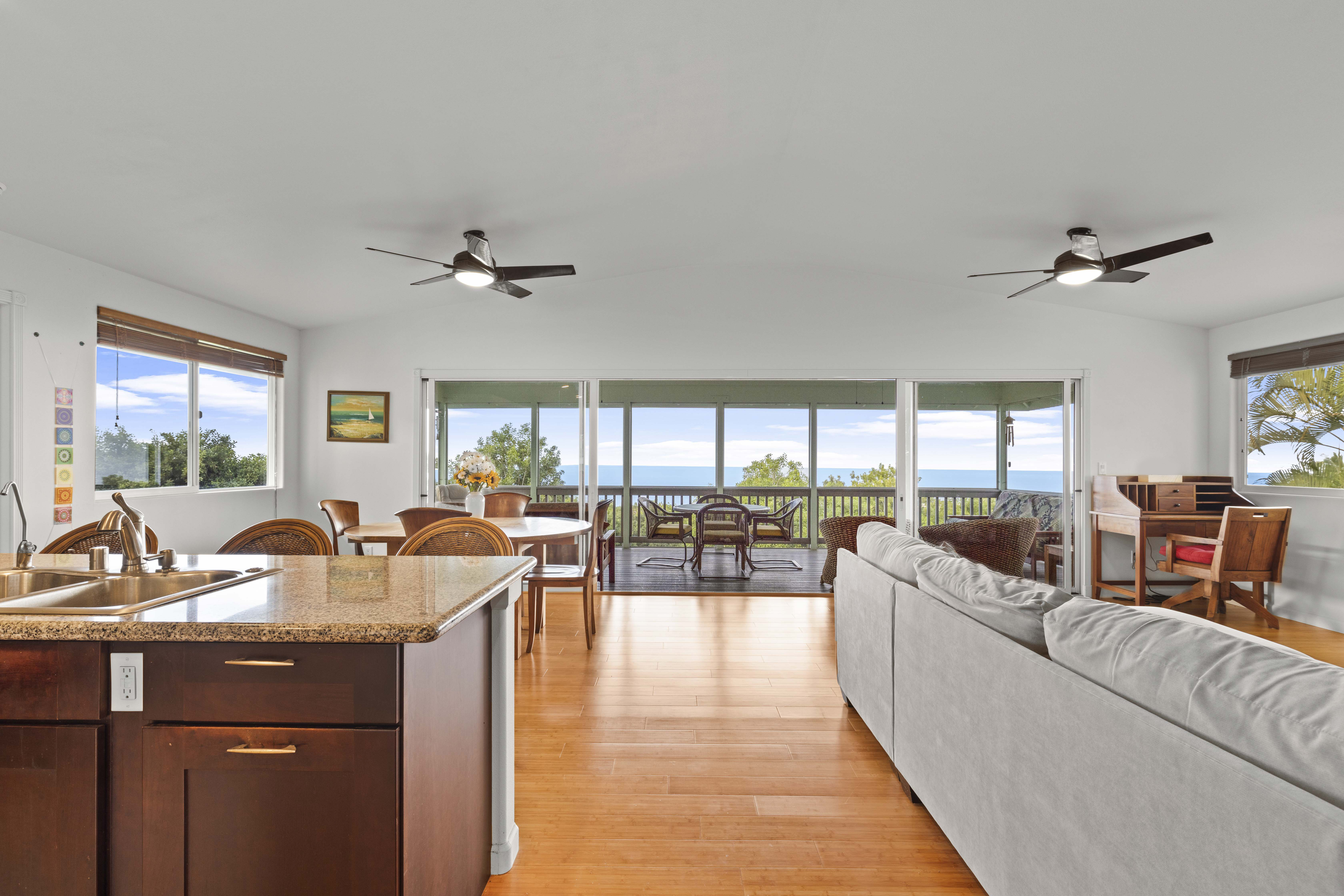 84-4955 Ke Ala O Keawe Road Captain Cook, HI 96704 - Photo 4 of 23 a living room with furniture and a large window