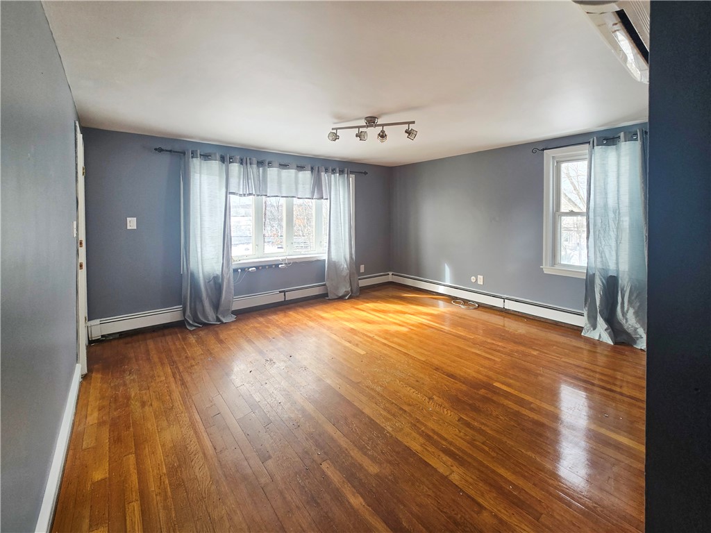 930 Elm Street, Unit 1 Woonsocket, RI 02895 - Photo 4 of 19 Large Living Room with view of pond