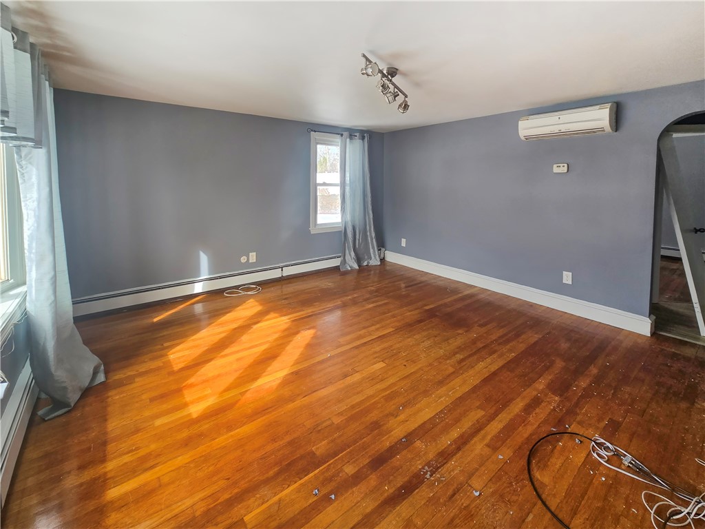 930 Elm Street, Unit 1 Woonsocket, RI 02895 - Photo 5 of 19 Large Living Room with view of pond