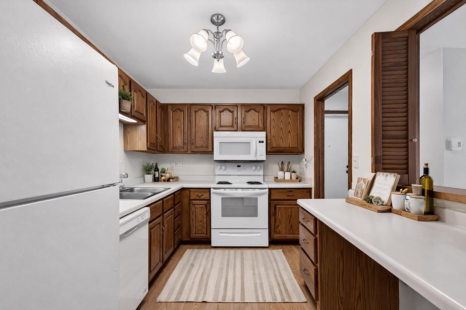 1451 Pheasant Run Drive, Unit 101 Mount Pleasant, WI 53406 - Photo 5 of 13 Virtually staged.