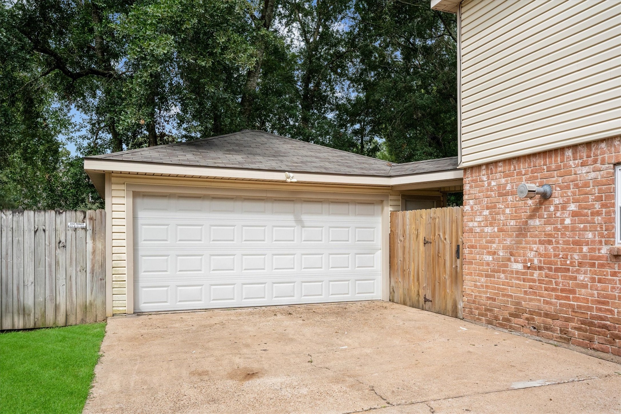 17319 Cypress Spring Drive Spring, TX 77388 - Photo 41 of 50 The detached garage also features a covered walkway to the house keeping you dry while you haul in groceries in the rain.