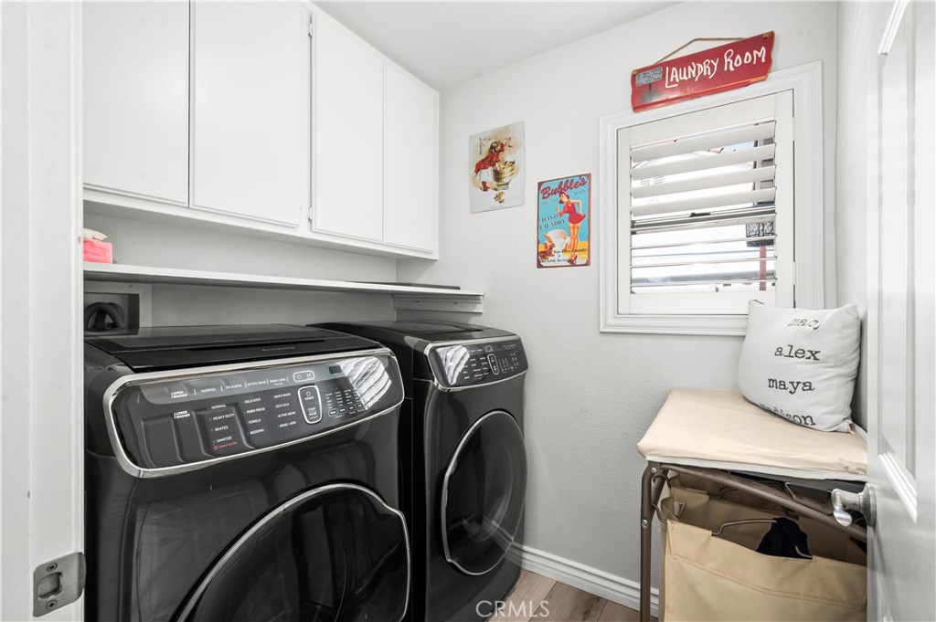 19465 Kinnow Lane Riverside, CA 92508 - Photo 21 of 61 a utility room with dryer and washer