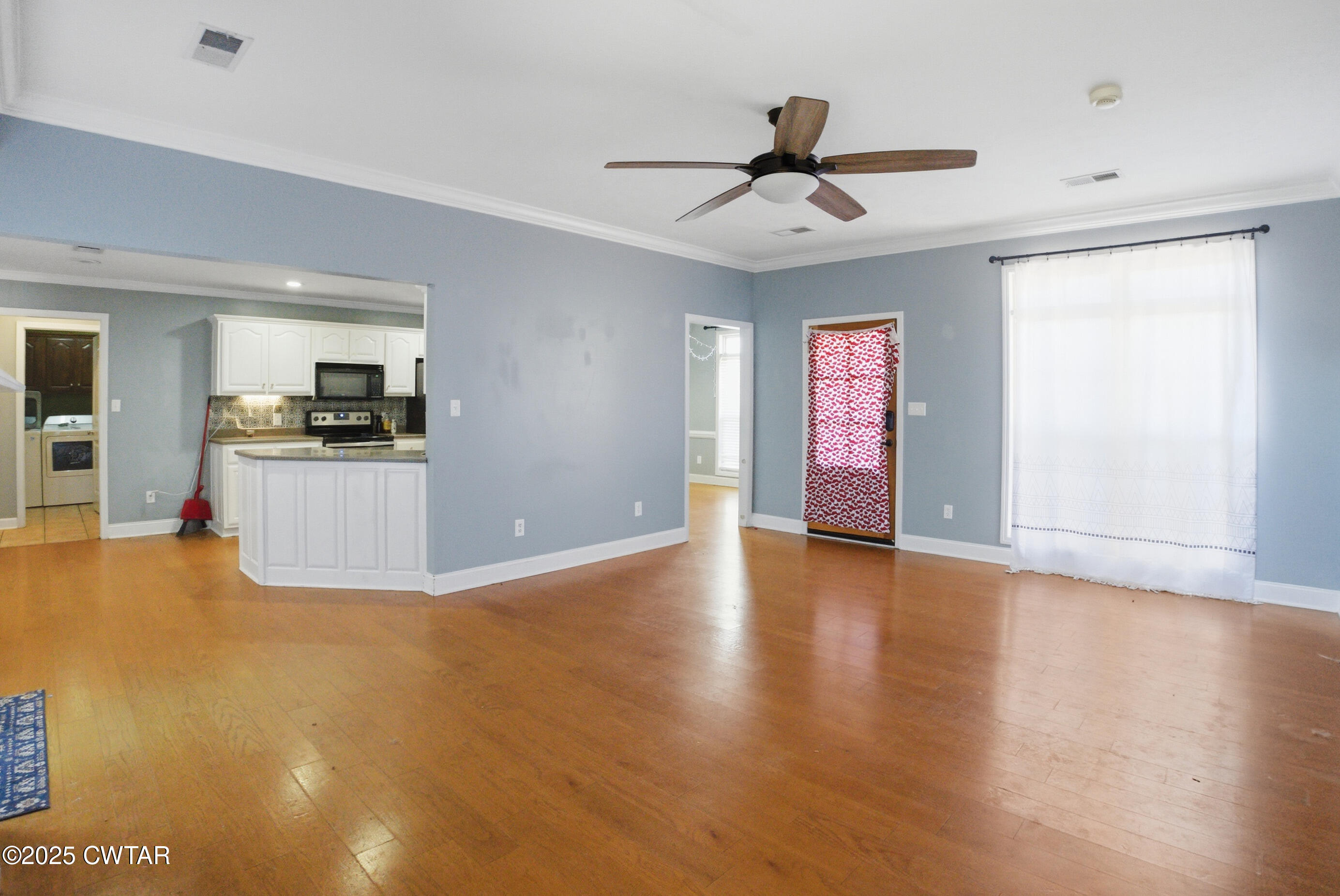 766 Mason Avenue Henderson, TN 38340 - Photo 3 of 16 a view of a kitchen with a sink and a window