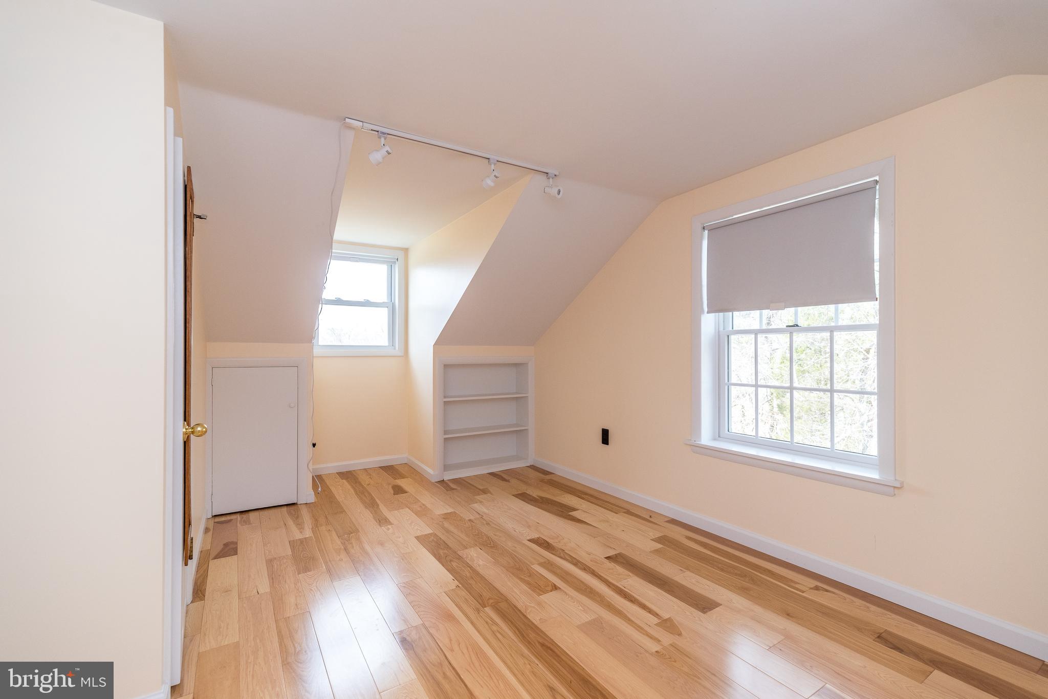 2361 Turk Road Doylestown, PA 18901 - Photo 2 of 32 an empty room with wooden floor and windows