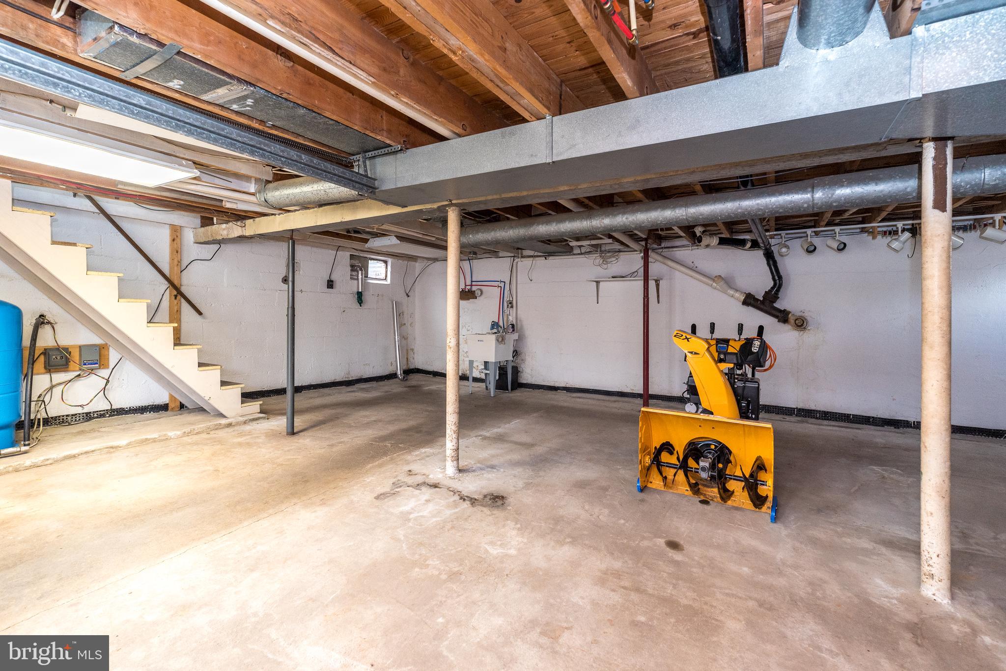 2361 Turk Road Doylestown, PA 18901 - Photo 24 of 32 a view of a garage with a table and chairs