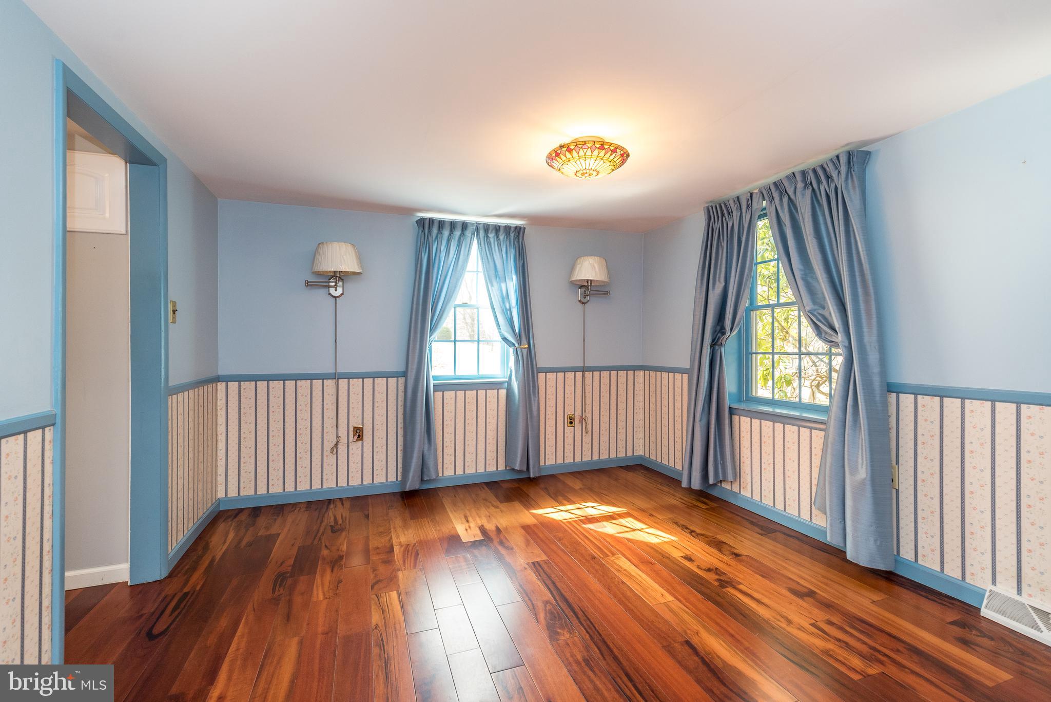 2361 Turk Road Doylestown, PA 18901 - Photo 9 of 32 an empty room with wooden floor and windows