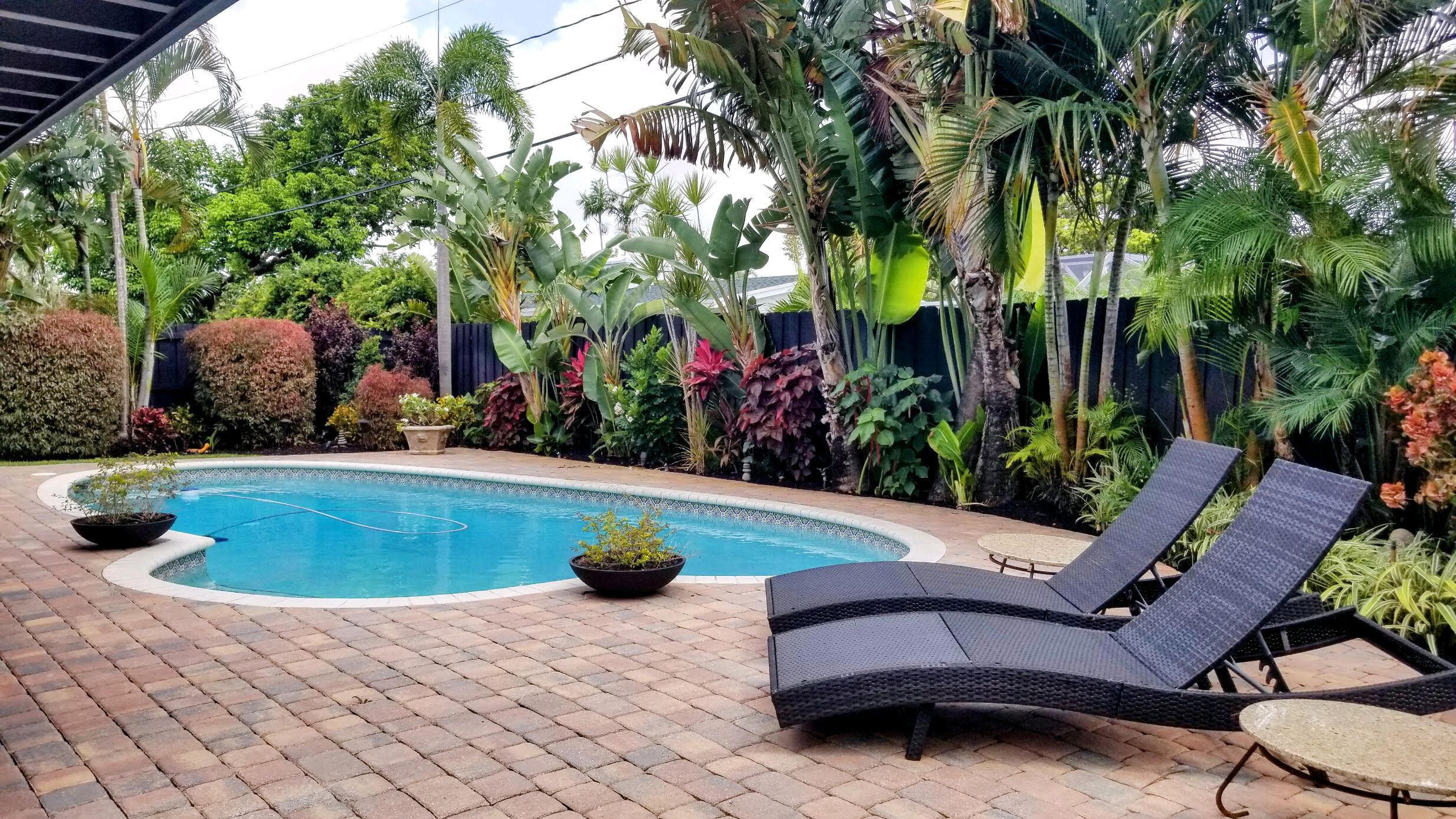 a view of swimming pool with lounge chair