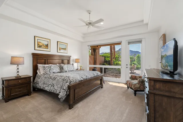 a bedroom with a bed and furniture