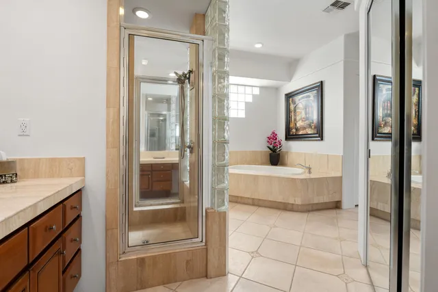 a living room with a large tub and shower
