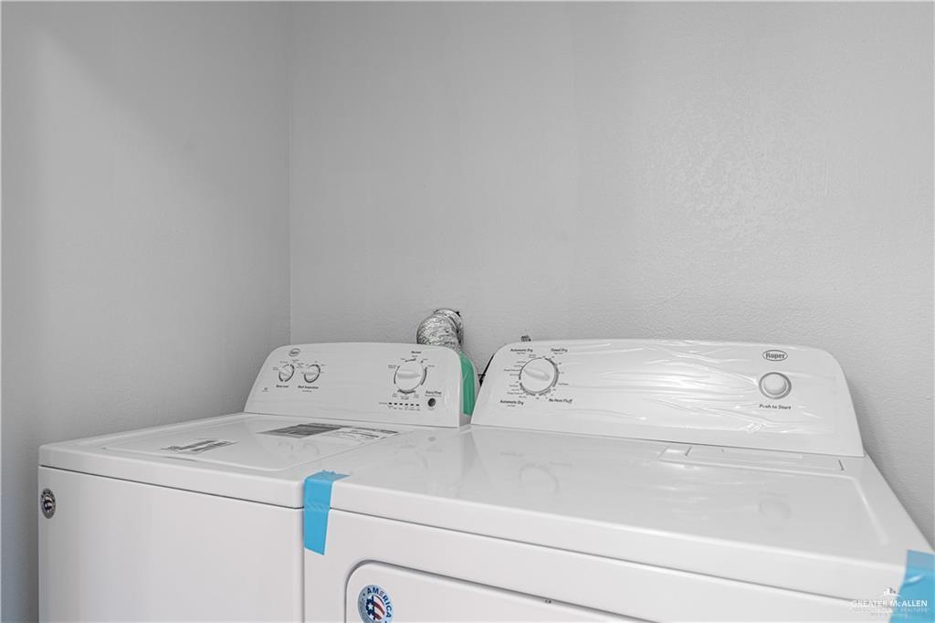 2201 South Jackson Road, Unit 31M Pharr, TX 78577 - Photo 10 of 13 White washer and dryer appliances