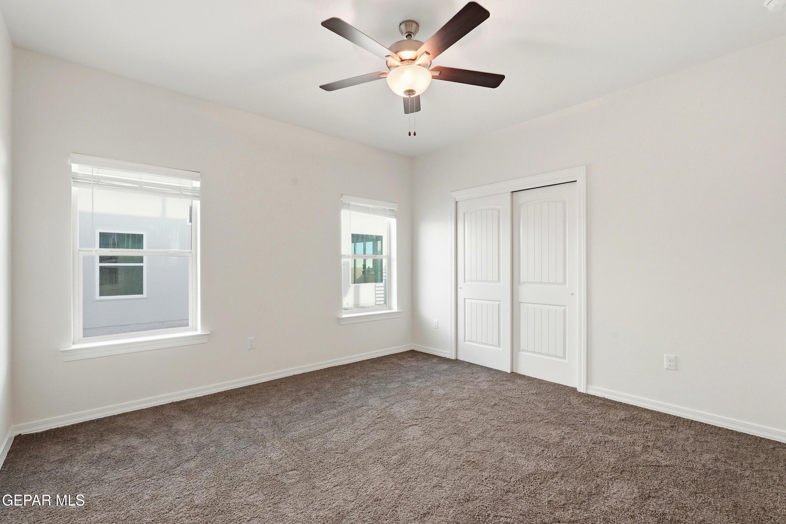 3764 Model Lane El Paso, TX 79938 - Photo 12 of 20 a view of an empty room with a window