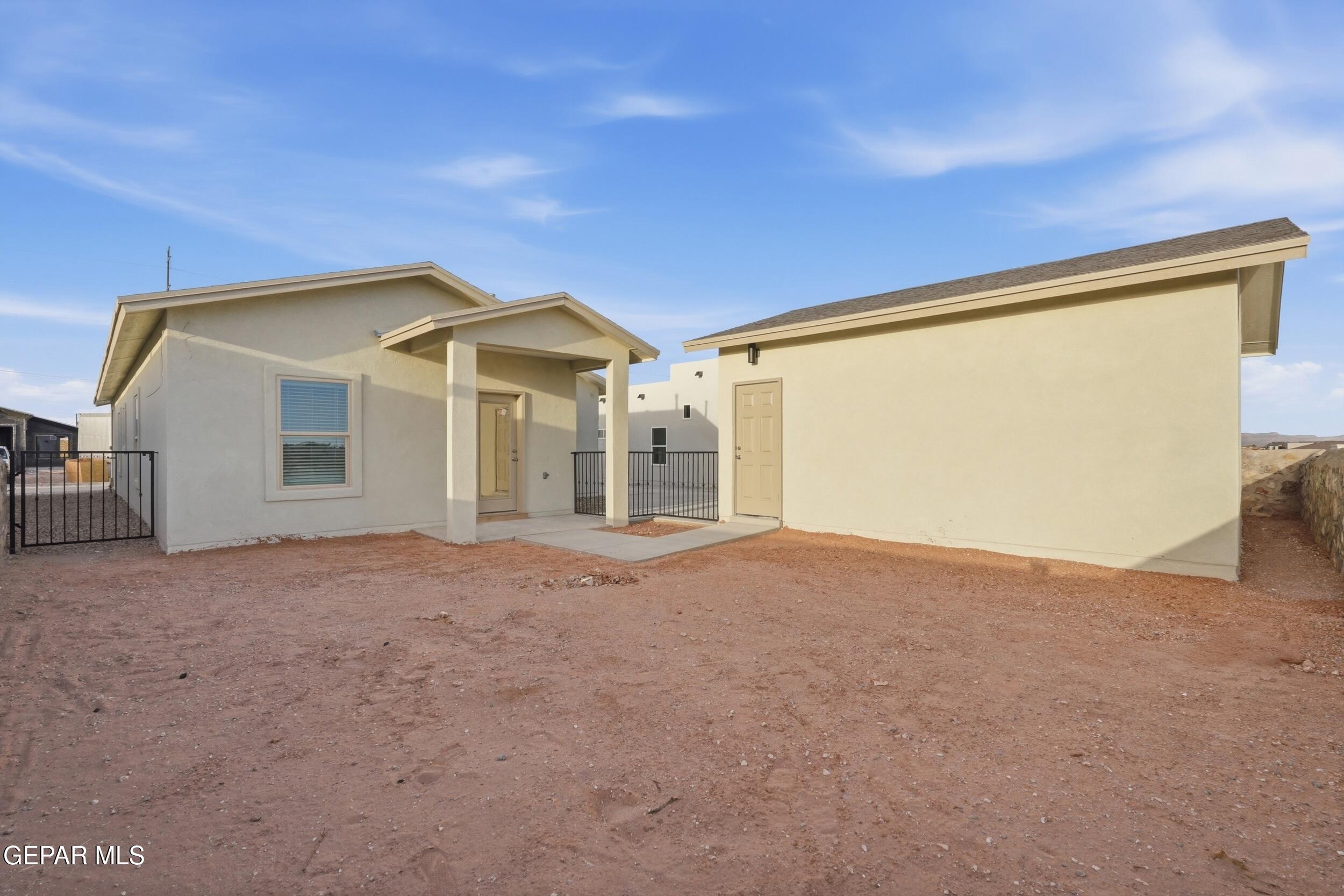 3764 Model Lane El Paso, TX 79938 - Photo 18 of 20 a view of a house with a outdoor space