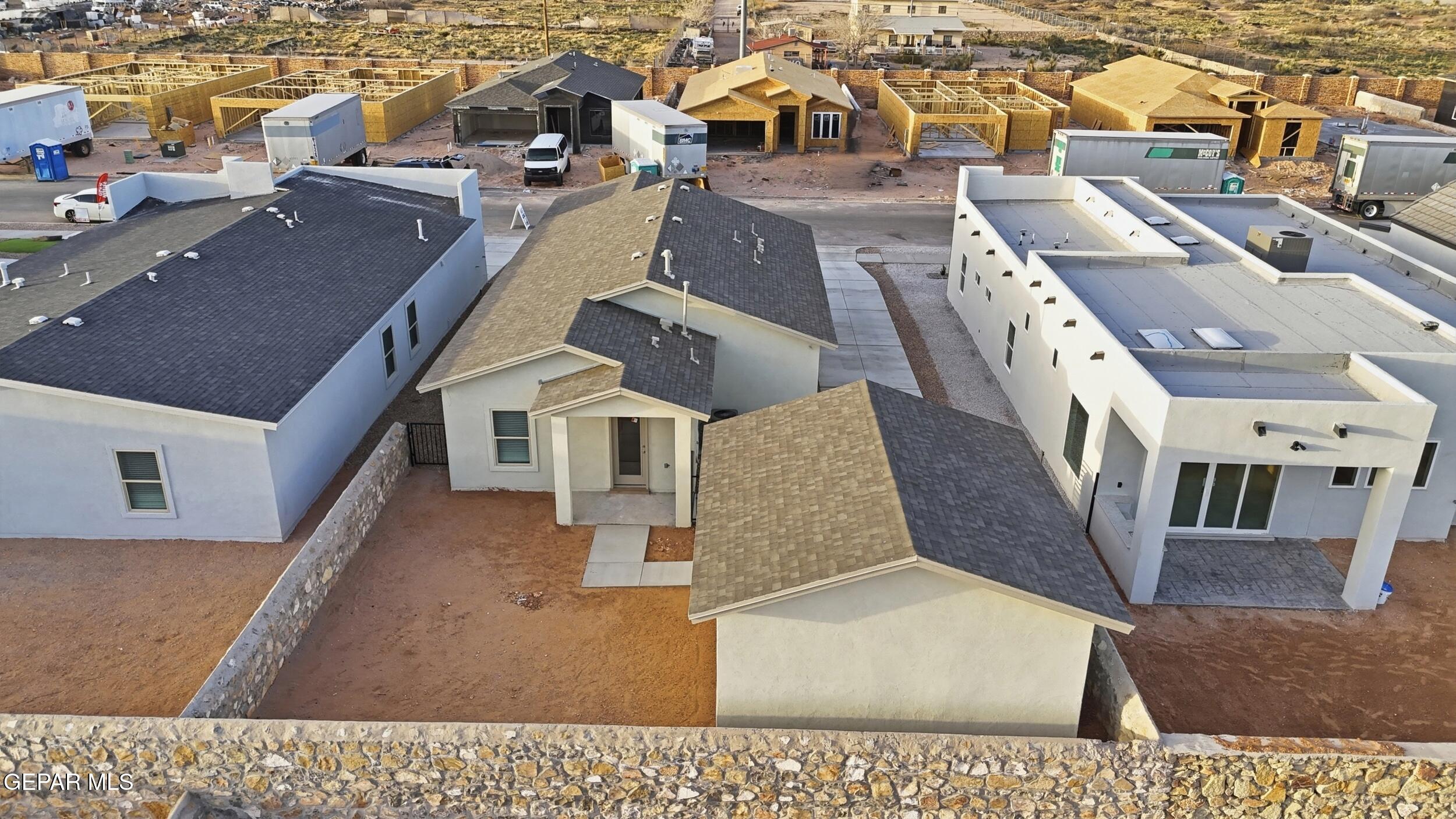 3764 Model Lane El Paso, TX 79938 - Photo 20 of 20 an aerial view of a house