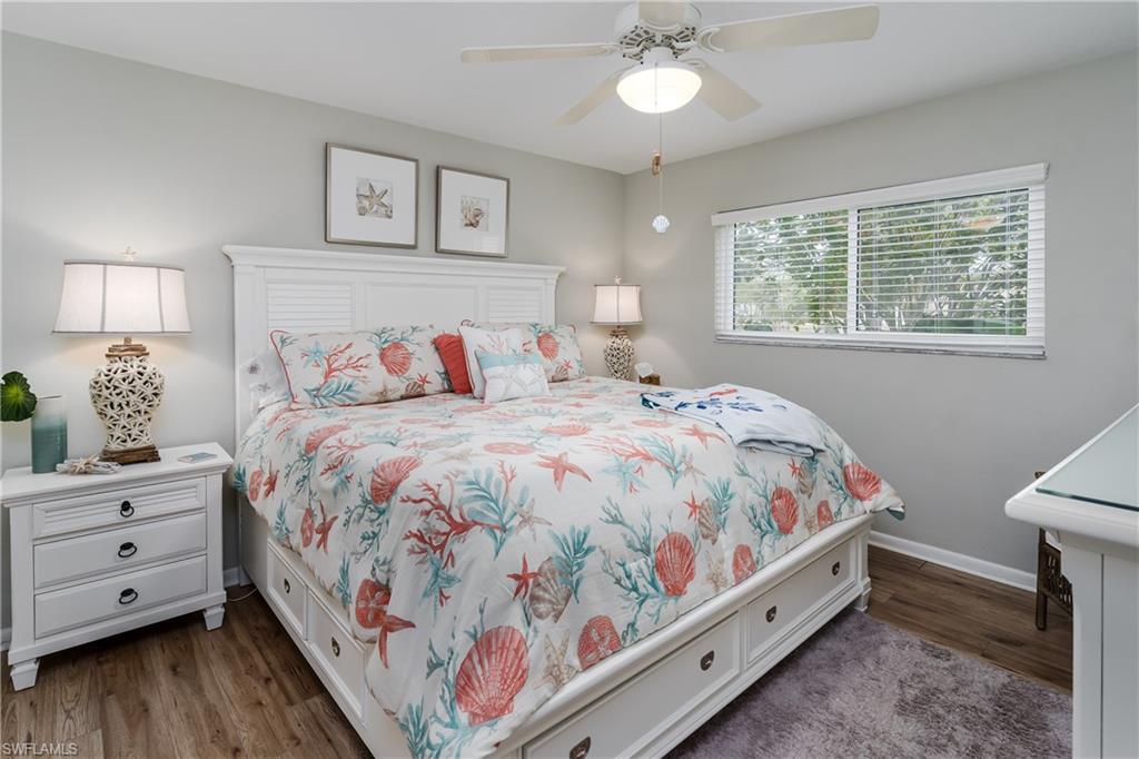 1014 Manatee Road, Unit F102 Naples, FL 34114 - Photo 13 of 36 a bedroom with a bed and a window