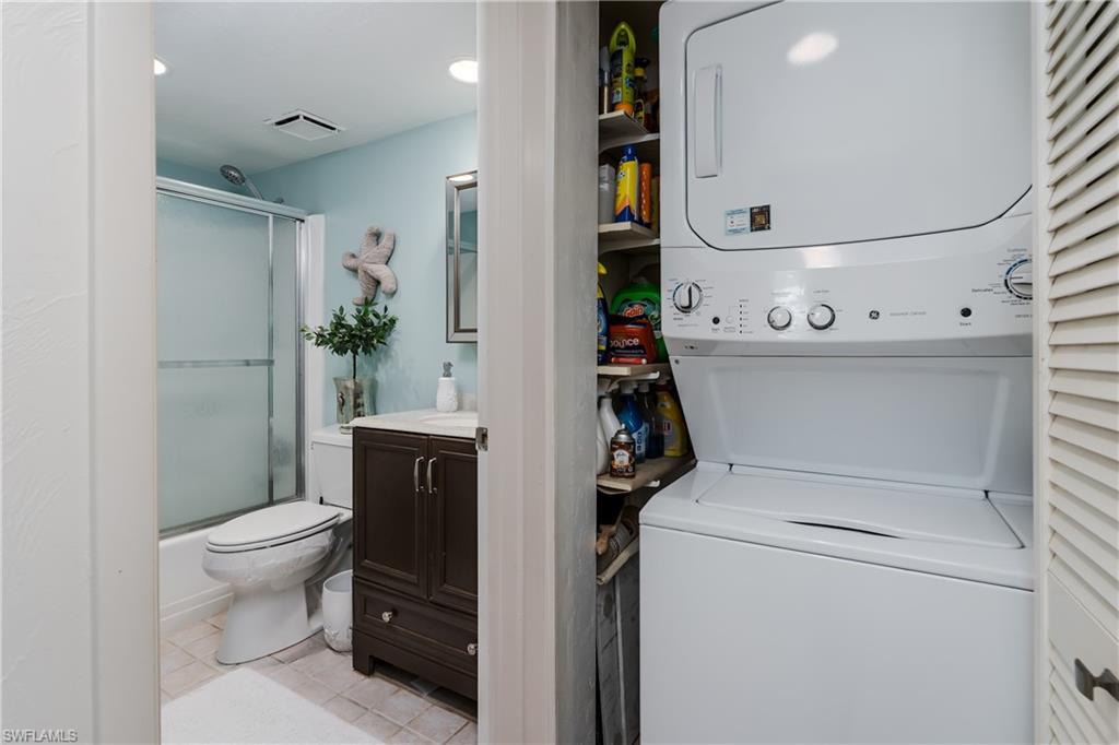 1014 Manatee Road, Unit F102 Naples, FL 34114 - Photo 20 of 36 a bathroom with a toilet and a shower