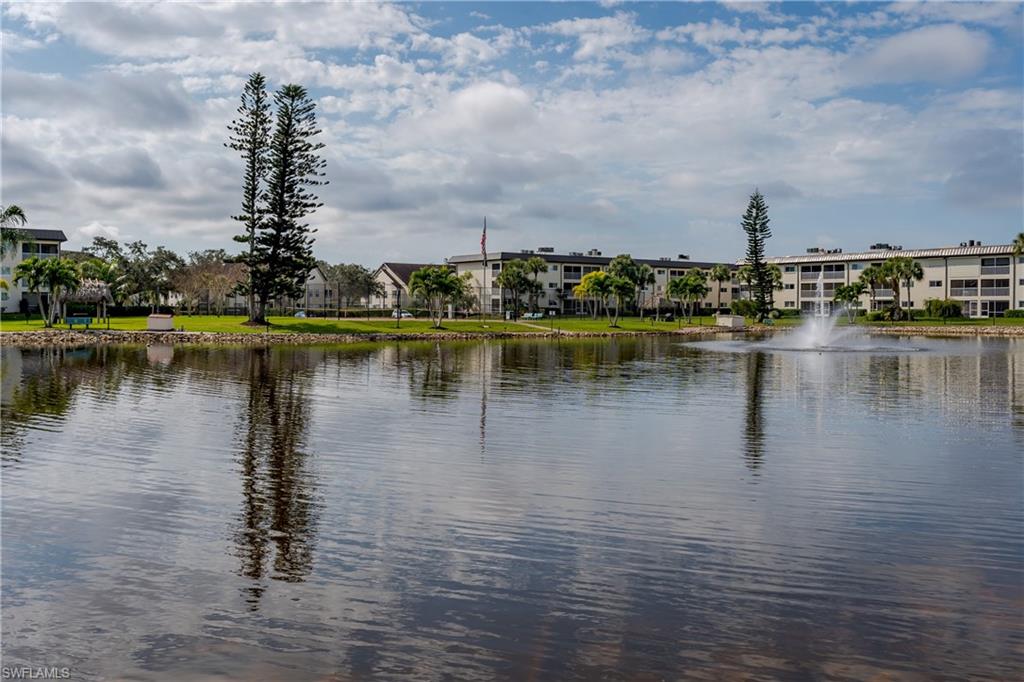 1014 Manatee Road, Unit F102 Naples, FL 34114 - Photo 31 of 36 a view of a lake with houses