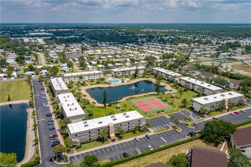 1014 Manatee Road, Unit F102 Naples, FL 34114 - Photo 34 of 36 an aerial view of residential houses with outdoor space