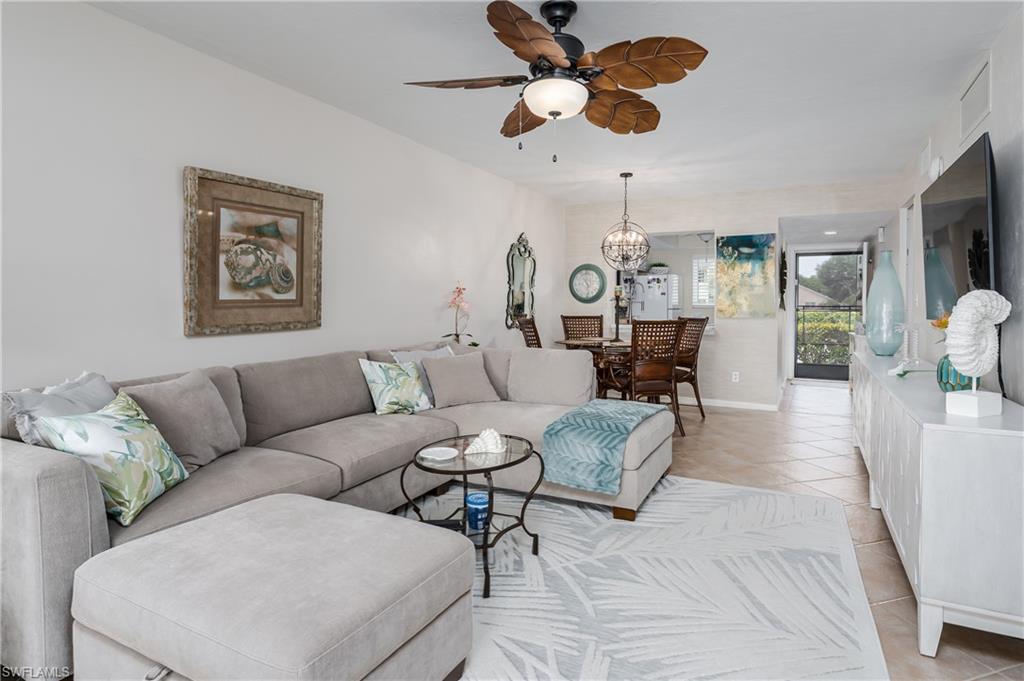1014 Manatee Road, Unit F102 Naples, FL 34114 - Photo 7 of 36 a living room with furniture