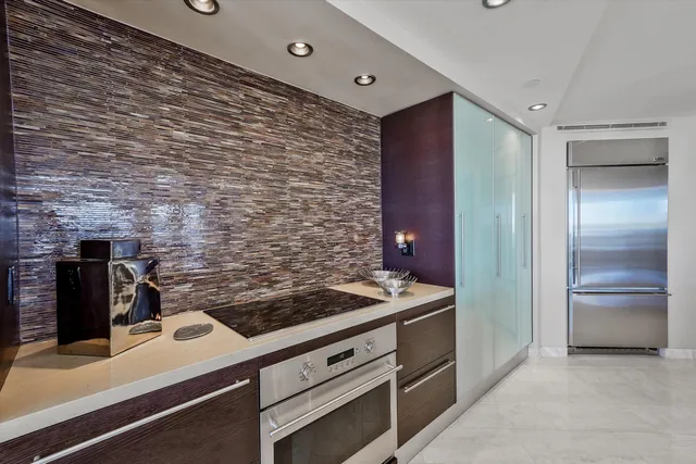 a balcony with furniture and city view