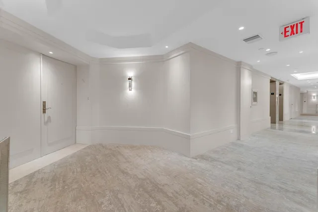 a kitchen with stainless steel appliances a refrigerator and cabinets