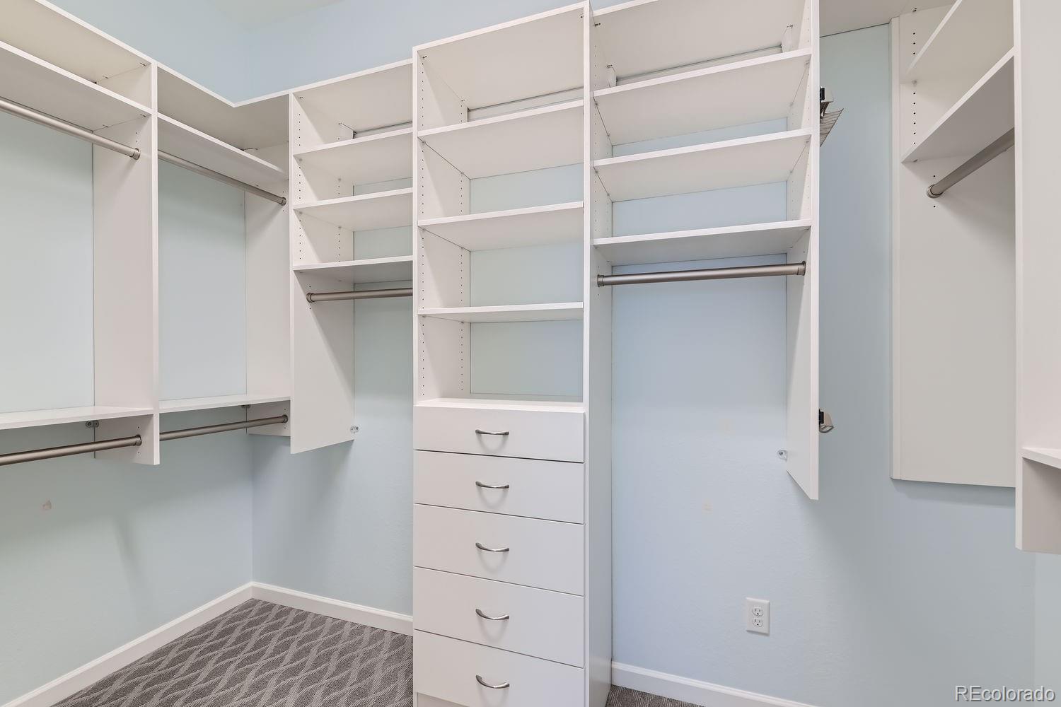 4500 Silver Mountain Loop Broomfield, CO 80023 - Photo 20 of 37 a view of walk in closet with empty racks
