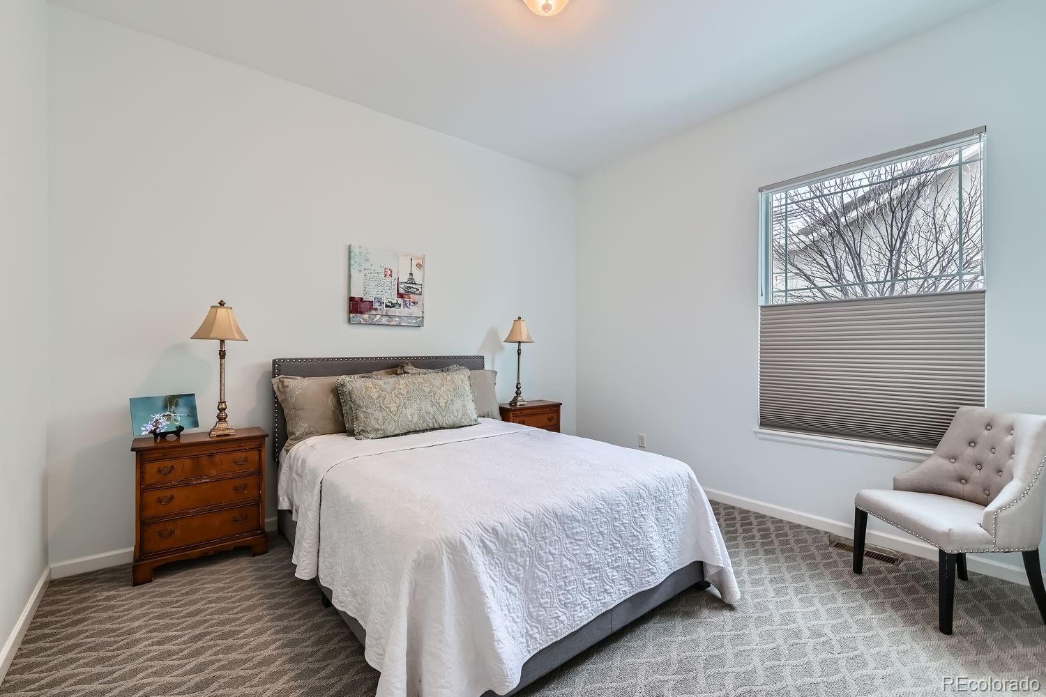 4500 Silver Mountain Loop Broomfield, CO 80023 - Photo 21 of 37 a bedroom with a bed and a couch