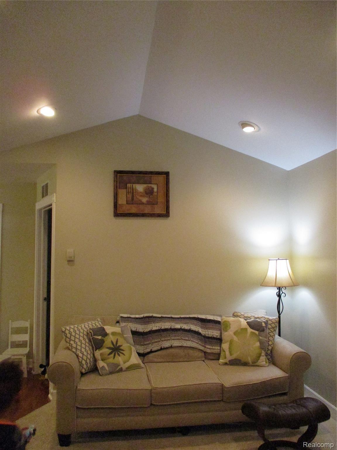 19215 Inkster Road Livonia, MI 48152 - Photo 4 of 43 LIVING ROOM VAULTED CEILINGS