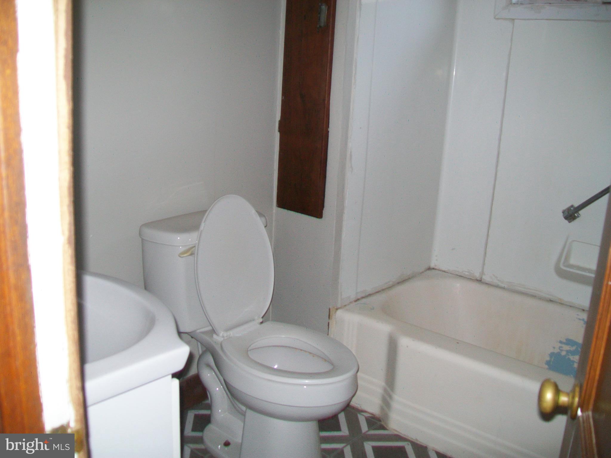 5621 Kiser Gap Road Upper Tract, WV 26866 - Photo 23 of 54 a white toilet sitting next to a bath tub