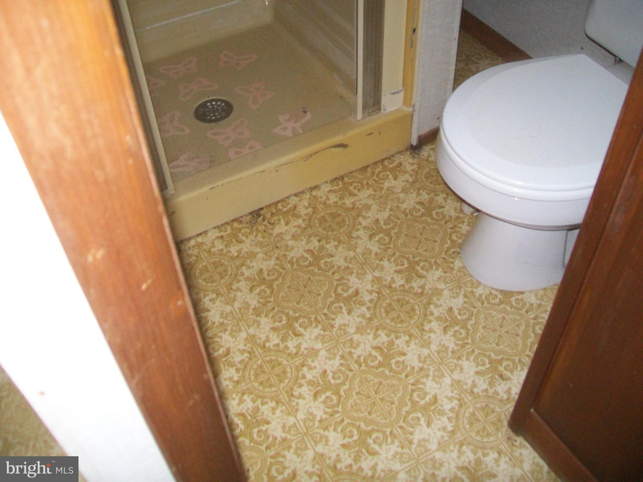 5621 Kiser Gap Road Upper Tract, WV 26866 - Photo 28 of 54 a bathroom with a granite countertop shower and a toilet