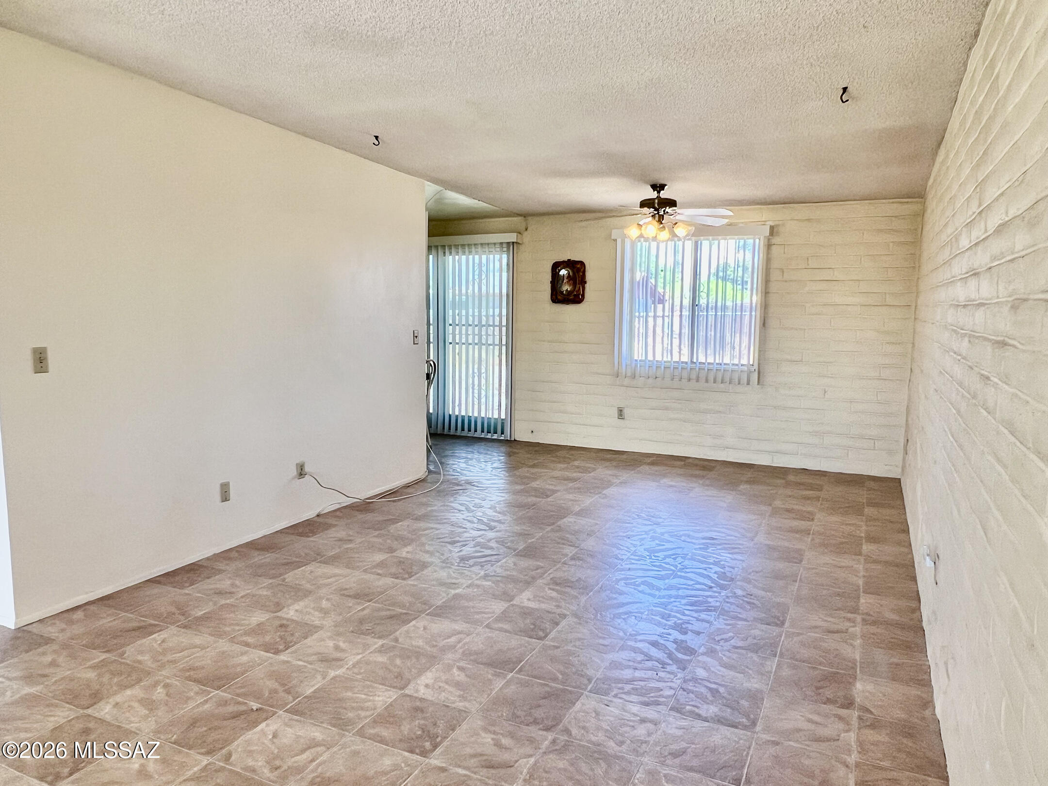 2955 South Kolb Road Tucson, AZ 85730 - Photo 8 of 24 Living Room View of Back Door and Window Leads to Huge Backyard