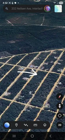 a view of a door and wooden fence