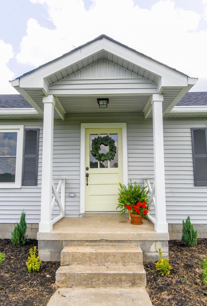 950 Owens Road Watertown, TN 37184 - Photo 2 of 30 a front view of a house with plants