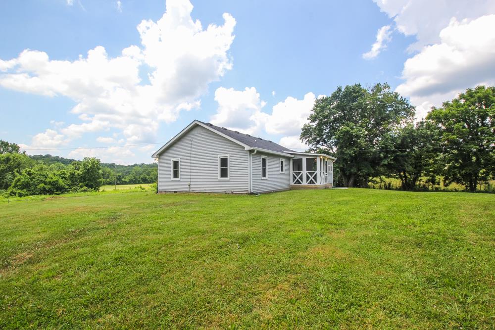 950 Owens Road Watertown, TN 37184 - Photo 25 of 30 a view of a house with backyard and garden