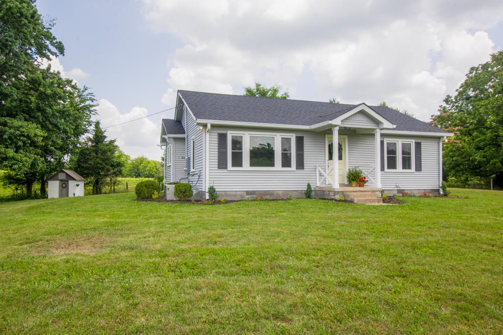 950 Owens Road Watertown, TN 37184 - Photo 28 of 30 a front view of house with yard and green space